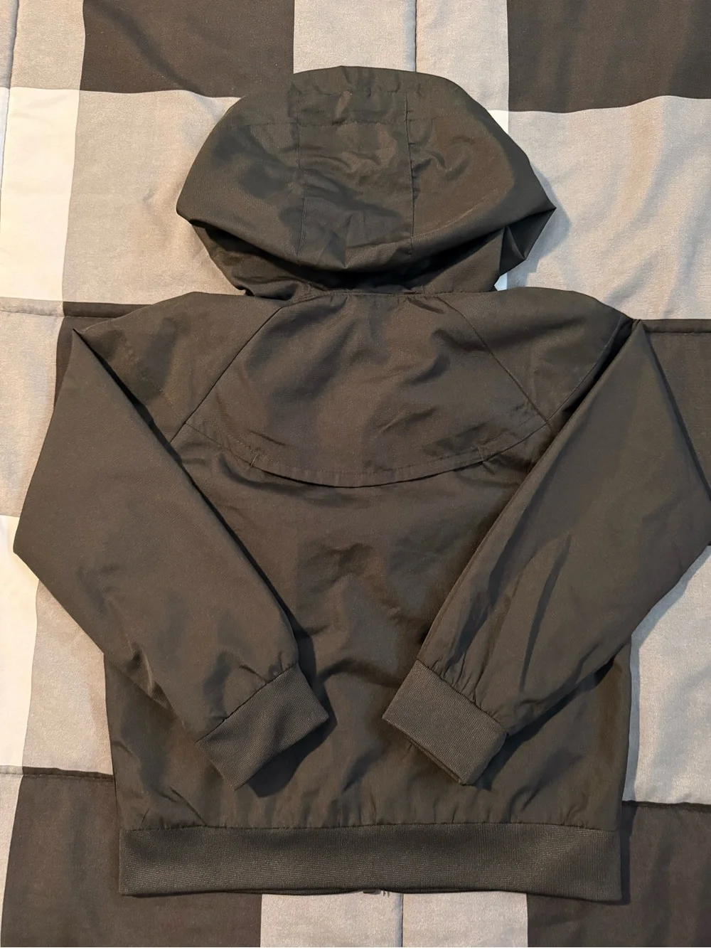 Nike Black Hooded Kids Rain Jacket with White Logo